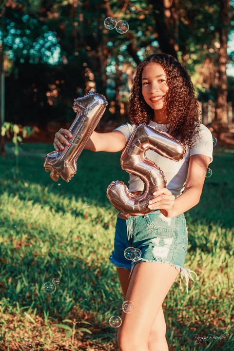 foto com balão de 15 anos'