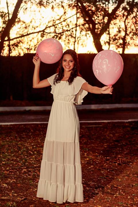 bexigas rosas e gestante '