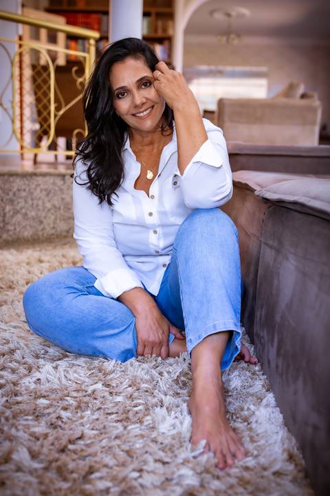 Ensaio feminino feito na casa da cliente'