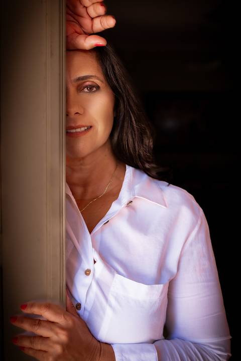 Ensaio feminino feito na casa da cliente'