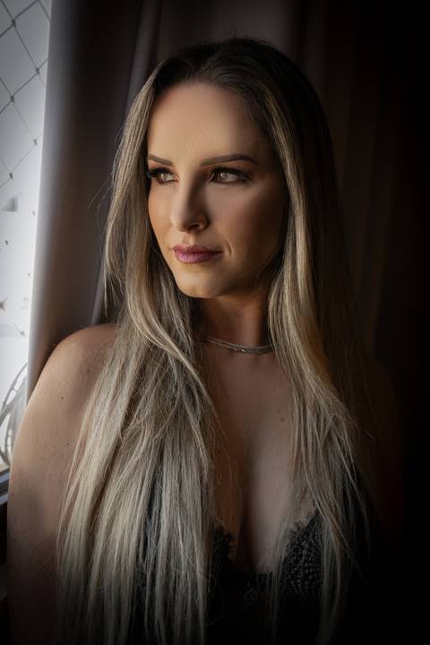 Ensaio feminino feito na casa da cliente'