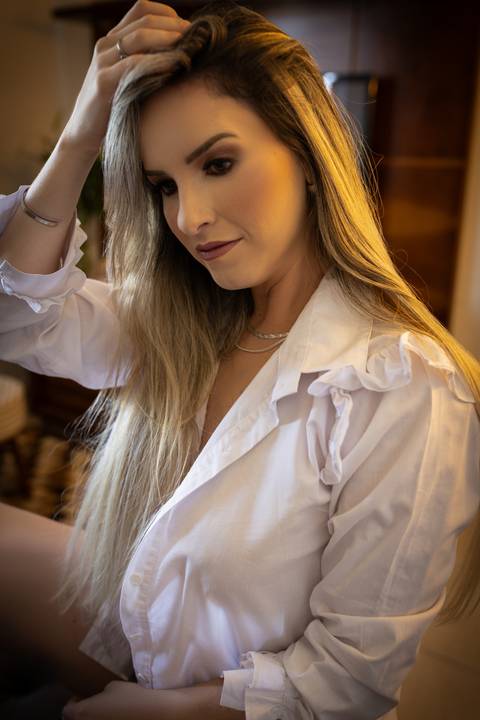 Ensaio feminino feito na casa da cliente'