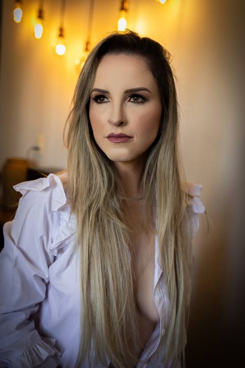 Ensaio feminino feito na casa da cliente'