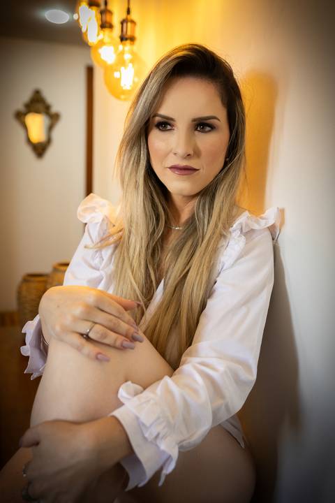 Ensaio feminino feito na casa da cliente'