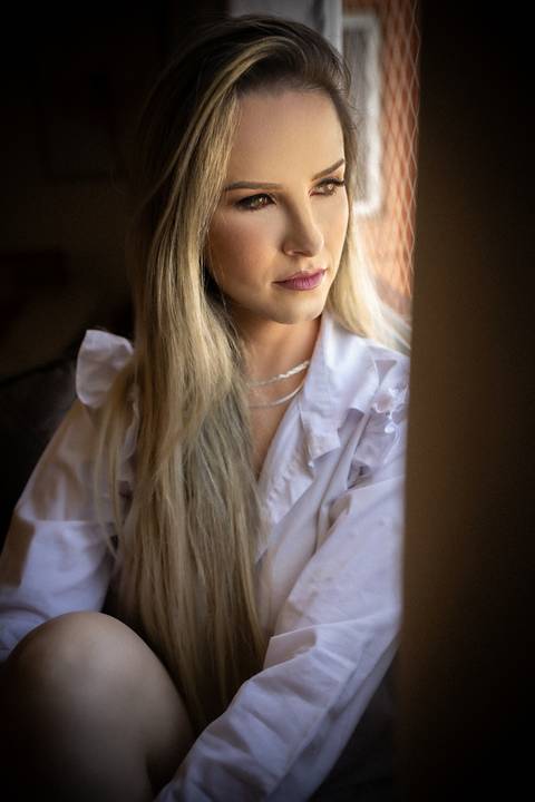 Ensaio feminino feito na casa da cliente'