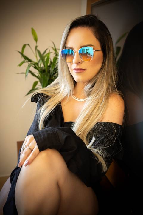 Ensaio feminino feito na casa da cliente'