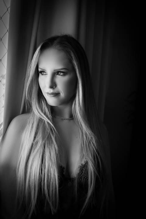 Ensaio feminino feito na casa da cliente'