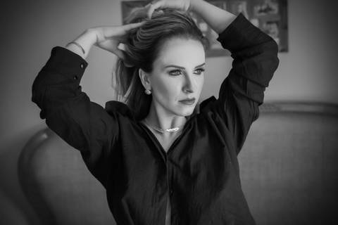 Ensaio feminino feito na casa da cliente'