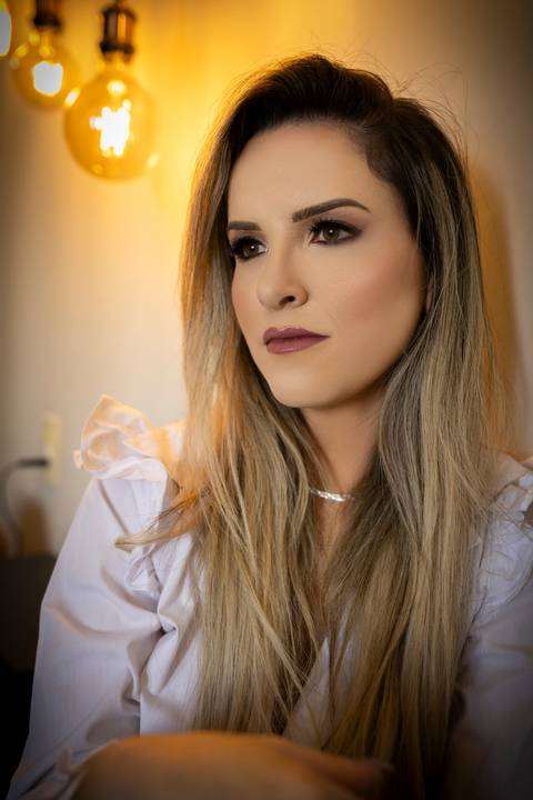 Ensaio feminino feito na casa da cliente'