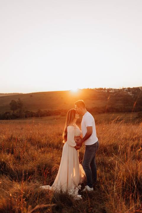 Ensaio gestante ao por do sol '