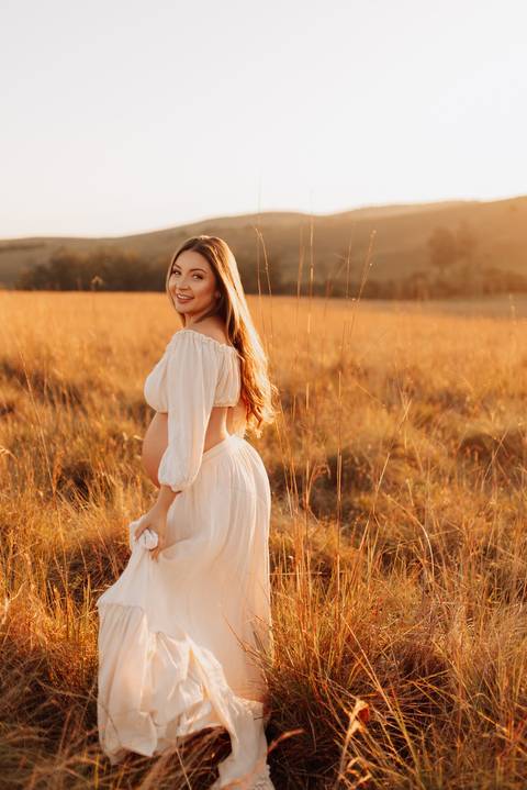 Ensaio gestante ao por do sol estilo boho'