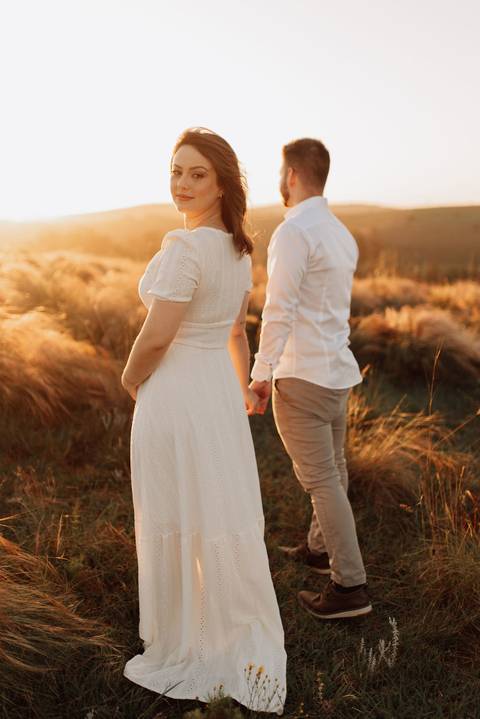 Ensaio ao por do sol revelando o sexo do bebê!

'