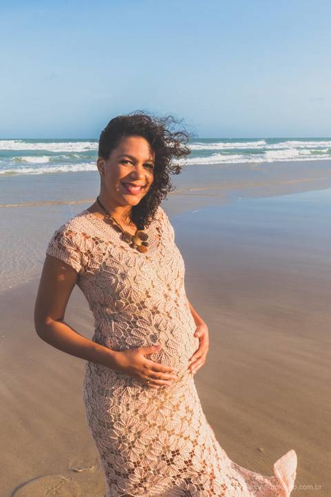 gestante na praia'