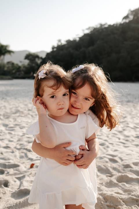 foto de irmãs em sessão de fotos'