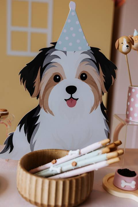 Ilustração de um cachorro usada como elemento decorativo na festa de 1 ano da Olívia.'