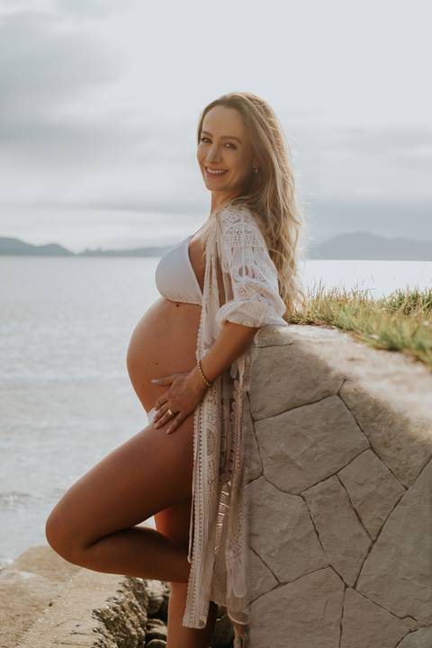 ensaio gestante por do sol de santos
'