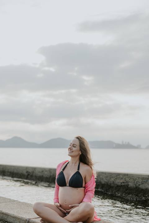 ensaio gestante por do sol de santos
'