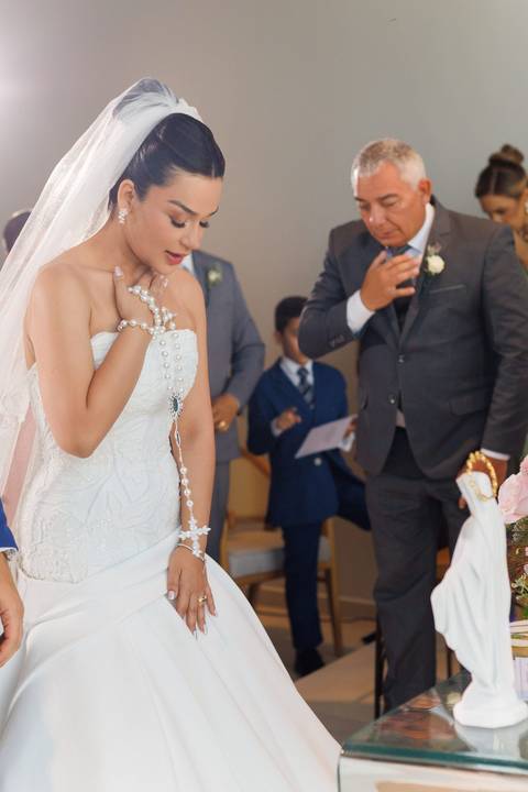 otografia da cerimônia de casamento, eternizando cada detalhe, cada sorriso e a emoção compartilhada pelos noivos e seus convidados.'