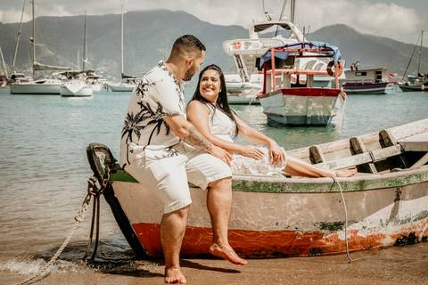 casal no barquinho'