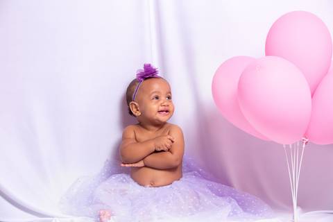 Será que ela viu um anjo que a fez sorrir?'