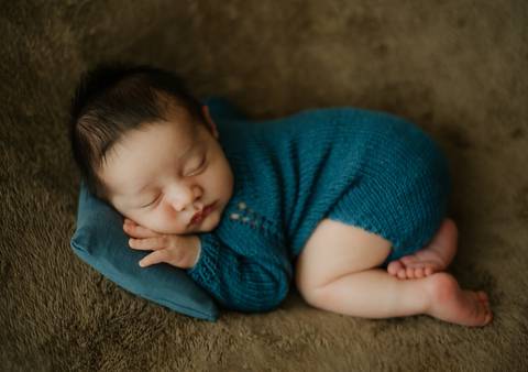ensaio fotográfico de recém-nascido'