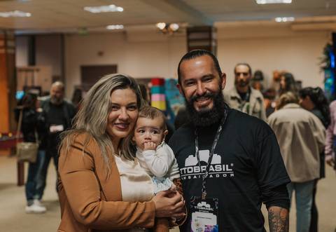 Workshop discutindo o papel da conexão na criação de retratos recém-nascidos autênticos.
'