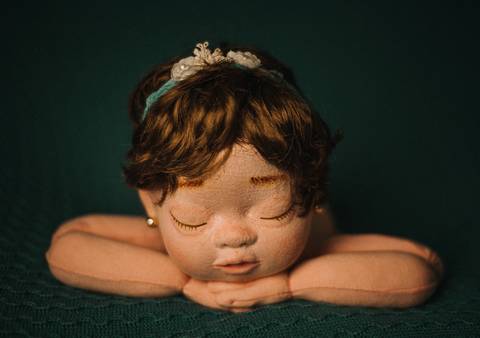 Boneca reborn em pose 