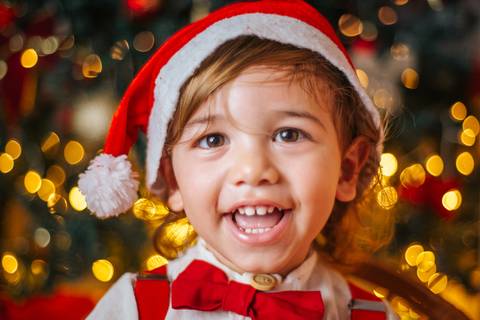 Ensaio de Natal com família grande em clima descontraído.'