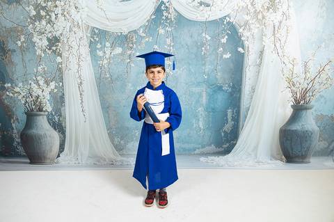 ensaio da educação infantil com beca'