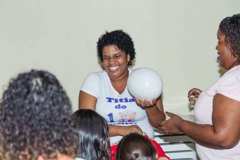 Titia sorrindo pelo fotógrafo Douglas Maia'