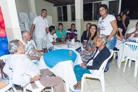 Familiares do Heitor sorrindo pelo fotógrafo Douglas Maia'