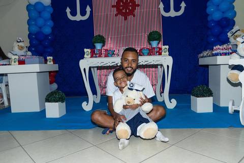 Pai e irmão do Heitor pelo fotógrafo Douglas Maia'