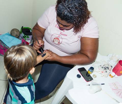 Pintura no braço pelo fotógrafo Douglas Maia'