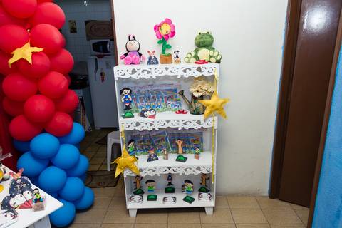 Armário com lembranças decorado Tema Show da Luna pelo fotógrafo Douglas Maia'