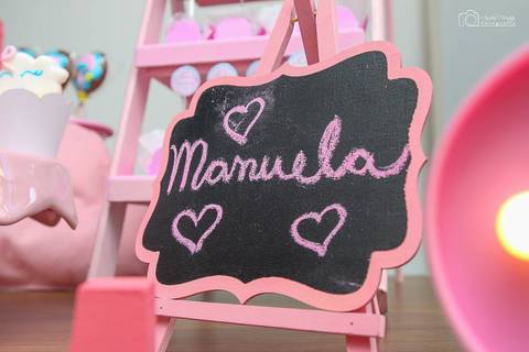 plaquinha com o nome de manuela'