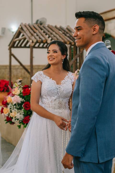 Noivos aguardando as alianças'