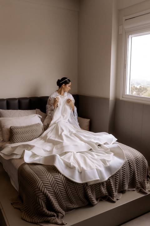 noiva com seu vestido'