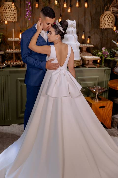 ensaio pós cerimonia na mesa do bolo'