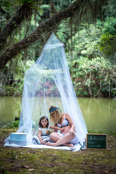 Gentante e filhas emsessão fotografica'