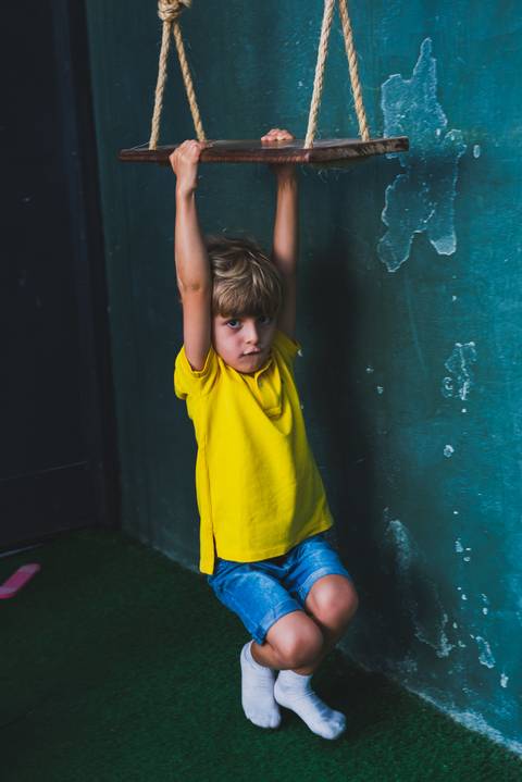 Pendurado no balanço'