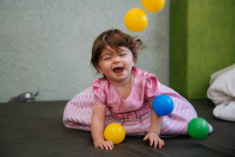 procuro tirar fotos em que a família esteja rindo e dando risadinhas'