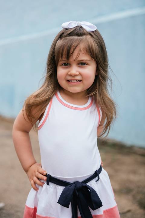 Retrato feito antes da celebração do batizado do irmãozinho'