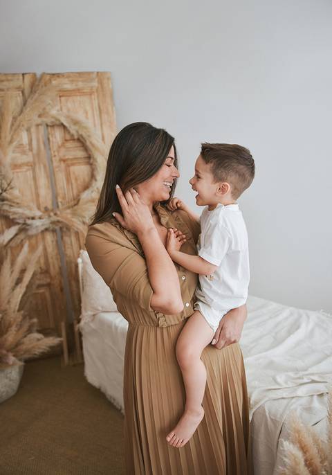 risos alegria mae e filho'