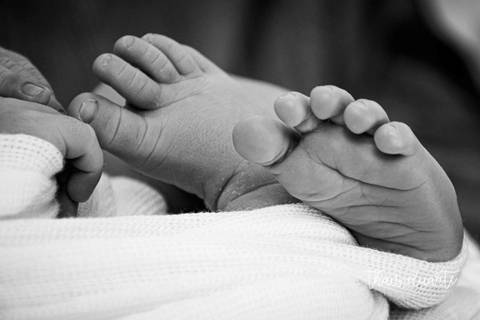 Fotografia pezinho de bebê'