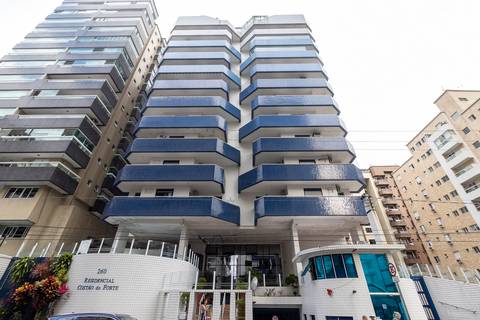 Fotografia profissional de uma cobertura no bairro Canto do Forte, em Praia Grande, SP, pelo fotógrafo profissional de imóveis Fernando Freire, foto para anúncio de apartamento no Airbnb e QuintoAndar. Fachada do prédio Costão do Forte.'