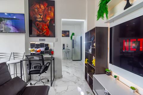 Apartamento decorado para locação de temporada em São Vicente, com vista para o mar e decoração de alto padrão – fotografia imobiliária profissional por Fernando Freire'