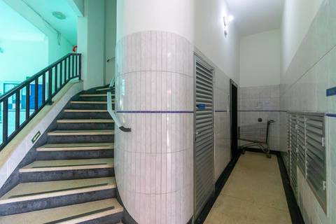 Fachada de prédio em São Vicente próximo à praia – fotografia imobiliária na Baixada Santista.'