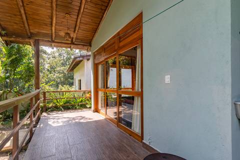 Casa de Temporada em Guaratuba - fotografia imobiliaria profissional para airbnb e booking de uma casa em bertioga por fernando freire fotografo de imoveis baixada santista e praia'