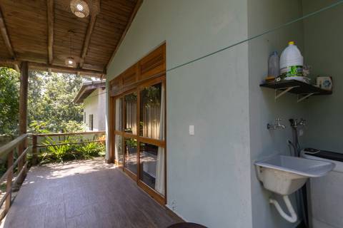 Casa de Temporada em Guaratuba - fotografia imobiliaria profissional para airbnb e booking de uma casa em bertioga por fernando freire fotografo de imoveis baixada santista e praia'