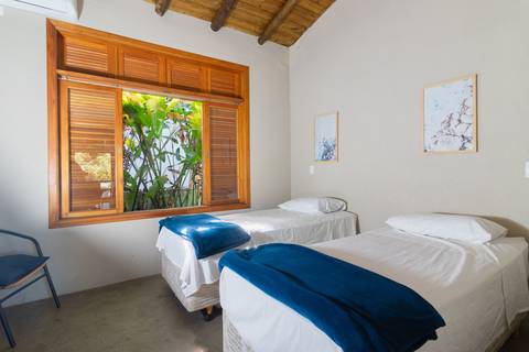 Casa de Temporada em Guaratuba - fotografia imobiliaria profissional para airbnb e booking de uma casa em bertioga por fernando freire fotografo de imoveis baixada santista e praia'